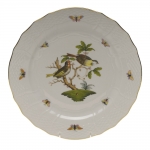 Rothschild Bird Service Plate, Motif #11 Many connoisseurs consider this pattern, first created in 1850 for the Rothschild family of Europe, to be the epitome of hand painting on porcelain. Twelve different motifs portray a 19th century tale about Baroness Rothschild, who lost her pearl necklace in the garden of her Vienna residence. Several days later it was found by her gardener, who saw birds playing with it in a tree. 
