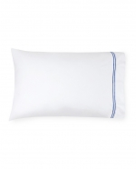 Grande Hotel White/Cornflower Blue Standard Pillowcases, Pair These linens are styled after those that grace the beds of some of the finest hotels in the world. So if you\'re wondering why you always sleep so well in a five-star hotel, this may be the answer. This ever-popular percale is embroidered with tailored double-rows of satin stitch in colors numerous enough to thrill a decorator. Plus, they\'re woven by our masters in Italy to last through many washings.

Fabrication:
Percale with double-row of satin stitch embroidery
Duvet Cover: U-Shape on top of bed
Shams: 4-sides
Flat Sheet and Pillowcases: Along cuff

Finishing:
Knife-edge hem on Duvet Covers
Classic-style flanges, approximate measurements:
Shams: 3-inches; Boudoir: 2-inches
Flat Sheet and Pillowcase cuffs: 4-inches

Hem:
Plain