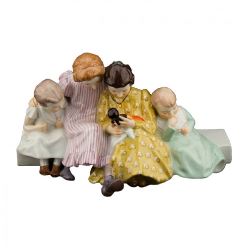 Four Children Sitting on Bench