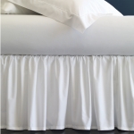 Celeste White Queen Bedskirt There\'s a reason why Celeste is by far our #1 best-selling percale bedding�it\'s like a favorite shirt that feels wonderful the moment you put it on, allowing you to relax into its cool comfort. Celeste is expertly woven to the perfect chamois-like softness, for the dreamiest nights of sleep.

Fabrication:
Percale

Finishing:
Classic-style flanges, approximate measurements:
Duvet Cover: 4-inches
Shams: 3-inches; Boudoir: 2-inches
Flat Sheet and Pillowcase cuffs: 3.5-inches

Hem:
Hemstitch
