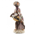 Hurdy Gurdy Player Figurine Created in 1753 by the highly gifted Johann Joachim Kaendler (1706-1775), the \Lyre Player\ is one of the 21 imaginative creations playing in the Monkey Orchestra.