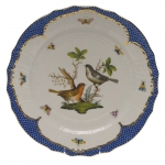 Rothschild Bird Blue Border Service Plate, Motif #5 The well-known Rothschild Bird design is made even more elaborate and elegant with the addition of a scalloped blue edge treatment bordered in 24kt gold. 
