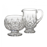 Lismore Footed Sugar and Creamer The Waterford Lismore pattern is a stunning combination of brilliance and clarity. The crisp whiteness of sugar and the subtle hue of thick, fresh cream are accentuated perfectly in the Lismore Footed Sugar & Creamer dishes. The dramatic clarity of Lismore\'s signature diamond and wedge cuts highlight the purity of their contents, while the footed base and comforting weight of Waterford\'s hand-crafted fine crystal add reassuring stability. 